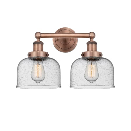 A large image of the Innovations Lighting 616-2W-10-16-L Bell Vanity Antique Copper / Seedy