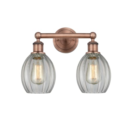 A large image of the Innovations Lighting 616-2W-13-15 Eaton Vanity Antique Copper / Clear