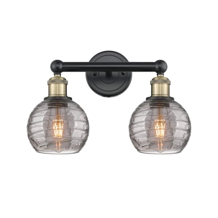 A large image of the Innovations Lighting 616-2W 10 15 Athens Deco Swirl Vanity Black Antique Brass / Light Smoke Deco Swirl