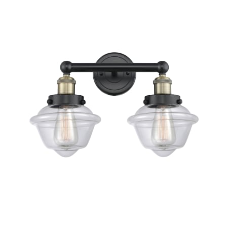 A large image of the Innovations Lighting 616-2W-10-16 Oxford Vanity Black Antique Brass / Clear