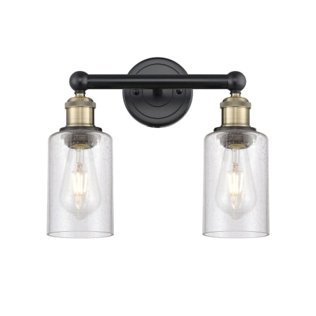 A large image of the Innovations Lighting 616-2W-11-13 Clymer Vanity Black Antique Brass / Seedy