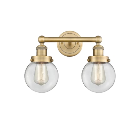 A large image of the Innovations Lighting 616-2W-10-16 Beacon Vanity Brushed Brass / Clear