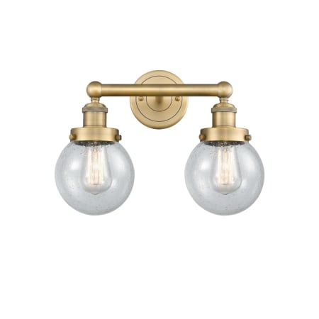 A large image of the Innovations Lighting 616-2W-10-16 Beacon Vanity Brushed Brass / Seedy