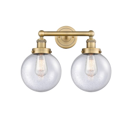 A large image of the Innovations Lighting 616-2W-10-16-L Beacon Vanity Brushed Brass / Seedy