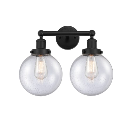 A large image of the Innovations Lighting 616-2W-10-16-L Beacon Vanity Matte Black / Seedy