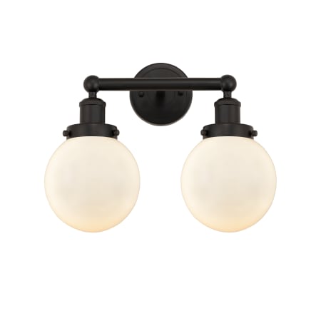 A large image of the Innovations Lighting 616-2W-10-16 Beacon Vanity Oil Rubbed Bronze / Matte White