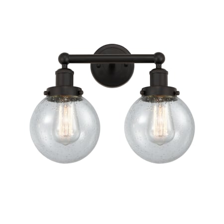 A large image of the Innovations Lighting 616-2W-10-16 Beacon Vanity Oil Rubbed Bronze / Seedy