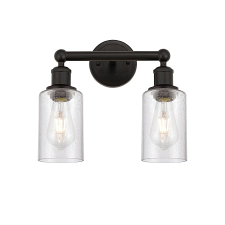 A large image of the Innovations Lighting 616-2W-11-13 Clymer Vanity Oil Rubbed Bronze / Seedy