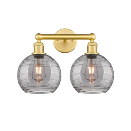 A large image of the Innovations Lighting 616-2W 12 17 Athens Deco Swirl Vanity Satin Gold / Light Smoke Deco Swirl