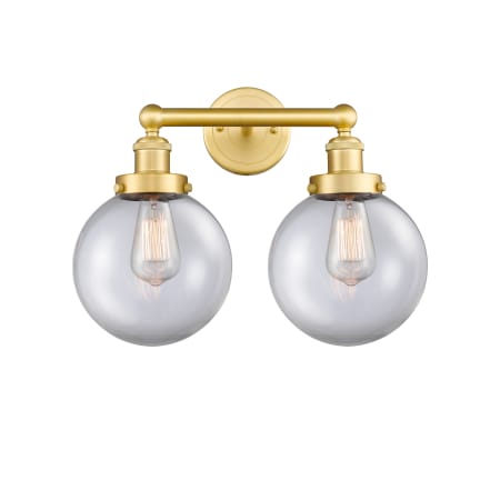 A large image of the Innovations Lighting 616-2W-10-16-L Beacon Vanity Satin Gold / Clear