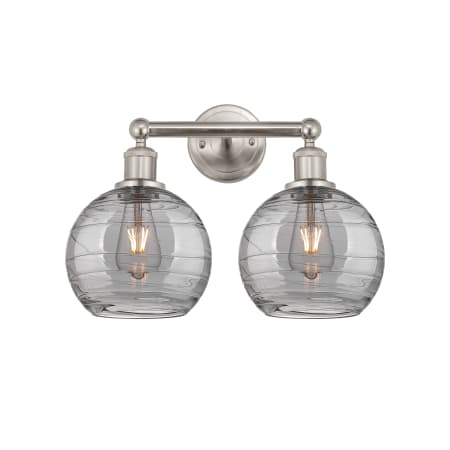 A large image of the Innovations Lighting 616-2W 12 17 Athens Deco Swirl Vanity Satin Nickel / Light Smoke Deco Swirl