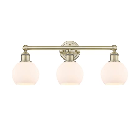 A large image of the Innovations Lighting 616-3W-11-24 Athens Vanity Antique Brass / Matte White