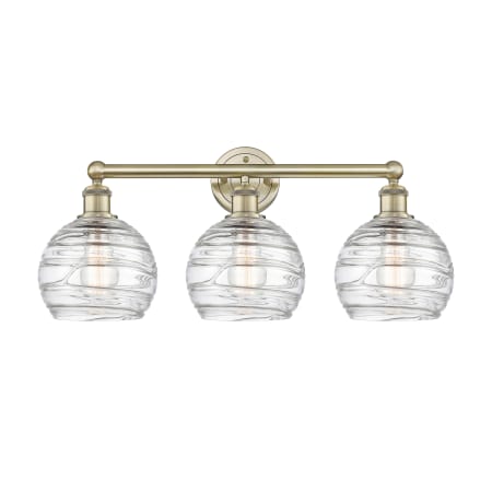 A large image of the Innovations Lighting 616-3W-13-26 Athens Vanity Antique Brass / Clear Deco Swirl