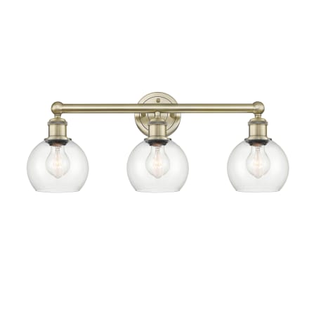 A large image of the Innovations Lighting 616-3W-11-24 Athens Vanity Antique Brass / Clear