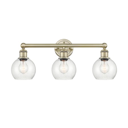 A large image of the Innovations Lighting 616-3W-11-24 Athens Vanity Antique Brass / Seedy