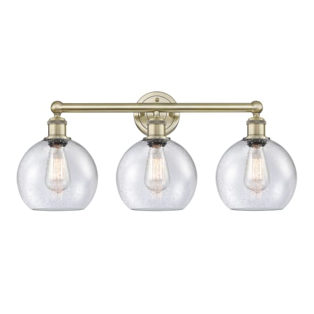 A large image of the Innovations Lighting 616-3W-13-26 Athens Vanity Antique Brass / Seedy