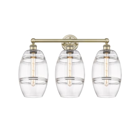 A large image of the Innovations Lighting 616-3W 12 26 Vaz Vanity Antique Brass / Clear