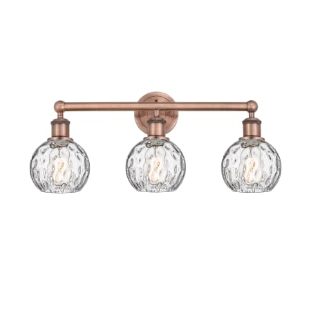 A large image of the Innovations Lighting 616-3W-11-24 Athens Vanity Antique Copper / Clear Water Glass