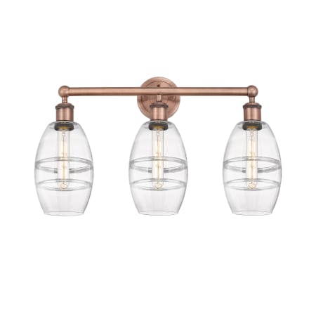 A large image of the Innovations Lighting 616-3W 10 24 Vaz Vanity Antique Copper / Clear