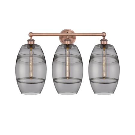 A large image of the Innovations Lighting 616-3W 12 26 Vaz Vanity Antique Copper / Light Smoke