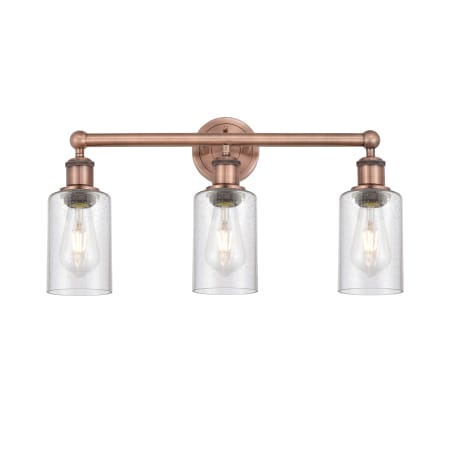 A large image of the Innovations Lighting 616-3W-11-22 Clymer Vanity Antique Copper / Seedy