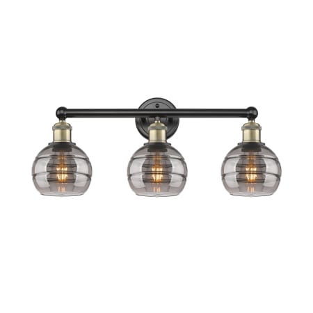 A large image of the Innovations Lighting 616-3W 10 24 Rochester Vanity Black Antique Brass / Light Smoke