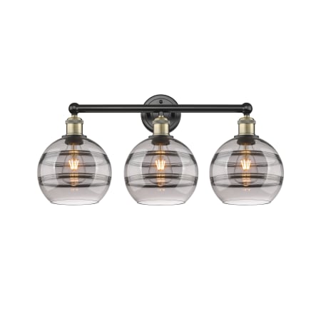 A large image of the Innovations Lighting 616-3W 12 26 Rochester Vanity Black Antique Brass / Light Smoke