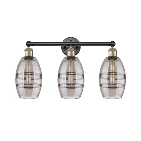 A large image of the Innovations Lighting 616-3W 10 24 Vaz Vanity Black Antique Brass / Light Smoke