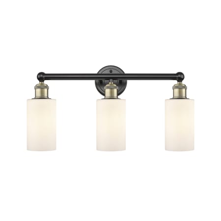 A large image of the Innovations Lighting 616-3W-12-22 Clymer Vanity Black Antique Brass / Matte White