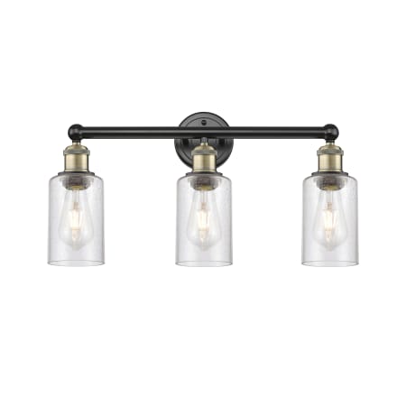 A large image of the Innovations Lighting 616-3W-11-22 Clymer Vanity Black Antique Brass / Seedy