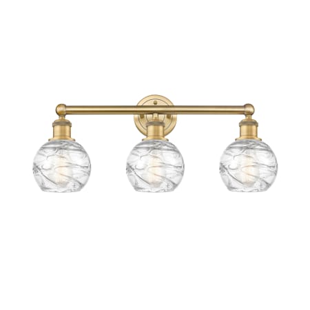 A large image of the Innovations Lighting 616-3W-11-24 Athens Vanity Brushed Brass / Clear Deco Swirl