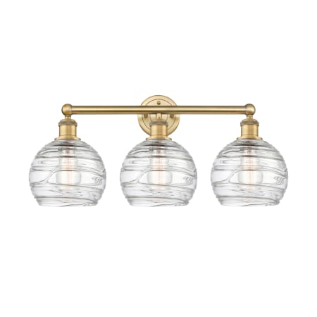 A large image of the Innovations Lighting 616-3W-13-26 Athens Vanity Brushed Brass / Clear Deco Swirl