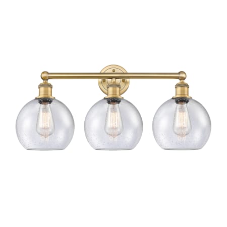 A large image of the Innovations Lighting 616-3W-13-26 Athens Vanity Brushed Brass / Seedy