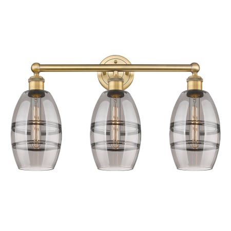 A large image of the Innovations Lighting 616-3W 10 24 Vaz Vanity Brushed Brass / Light Smoke