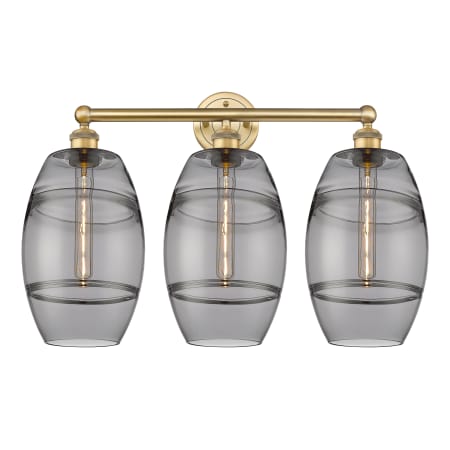 A large image of the Innovations Lighting 616-3W 12 26 Vaz Vanity Brushed Brass / Light Smoke