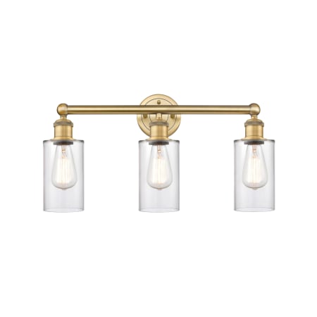 A large image of the Innovations Lighting 616-3W-12-22 Clymer Vanity Brushed Brass / Clear