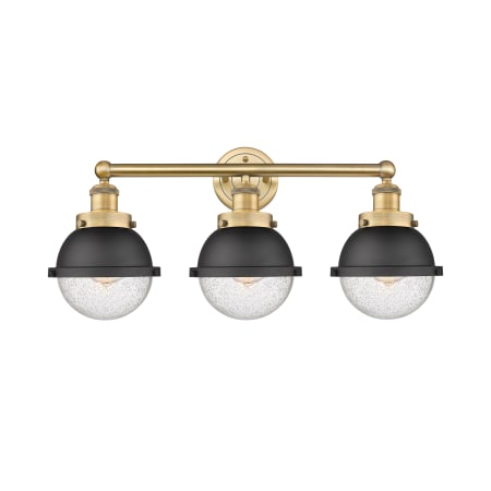 A large image of the Innovations Lighting 616-3W-12-25 Hampden Vanity Brushed Brass / Seedy