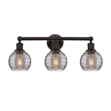 A large image of the Innovations Lighting 616-3W 10 24 Athens Deco Swirl Vanity Oil Rubbed Bronze / Light Smoke Deco Swirl