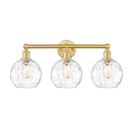 A large image of the Innovations Lighting 616-3W-13-26 Athens Vanity Satin Gold / Clear Water Glass