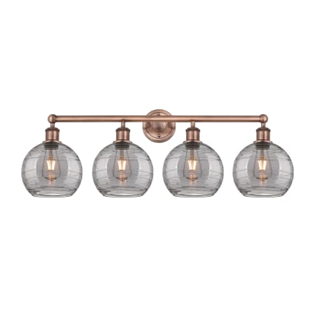 A large image of the Innovations Lighting 616-4W 12 35 Athens Deco Swirl Vanity Antique Copper / Light Smoke Deco Swirl