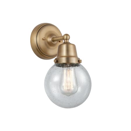 A large image of the Innovations Lighting 623-1W-12-6 Beacon Sconce Brushed Brass / Seedy