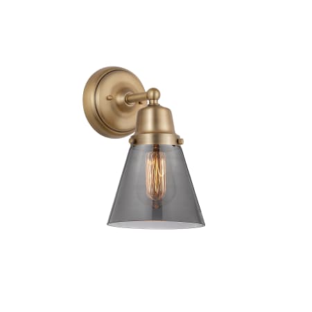 A large image of the Innovations Lighting 623-1W-12-6 Cone Sconce Brushed Brass / Plated Smoke