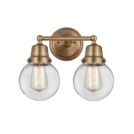A large image of the Innovations Lighting 623-2W-12-14 Beacon Vanity Brushed Brass / Clear