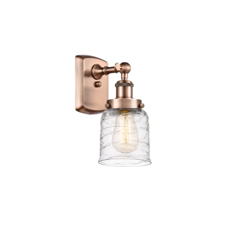 A large image of the Innovations Lighting 916-1W-12-5 Bell Sconce Antique Copper / Deco Swirl