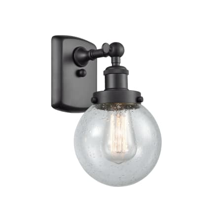 A large image of the Innovations Lighting 916-1W Beacon Matte Black / Seedy