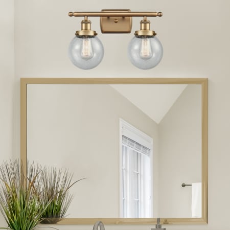 A large image of the Innovations Lighting 916-2W-11-16 Beacon Vanity Alternate Image