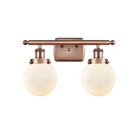 A large image of the Innovations Lighting 916-2W-11-16 Beacon Vanity Antique Copper / Matte White