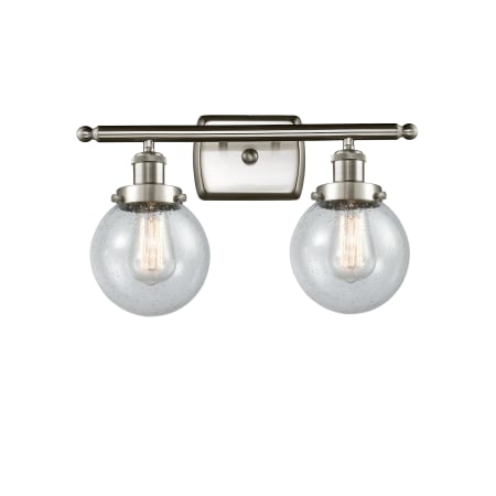 A large image of the Innovations Lighting 916-2W Beacon Brushed Satin Nickel / Seedy