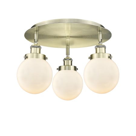 A large image of the Innovations Lighting 916-3C-10-18 Beacon Flush Antique Brass / Matte White
