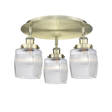A large image of the Innovations Lighting 916-3C-10-18 Colton Flush Antique Brass / Clear Halophane
